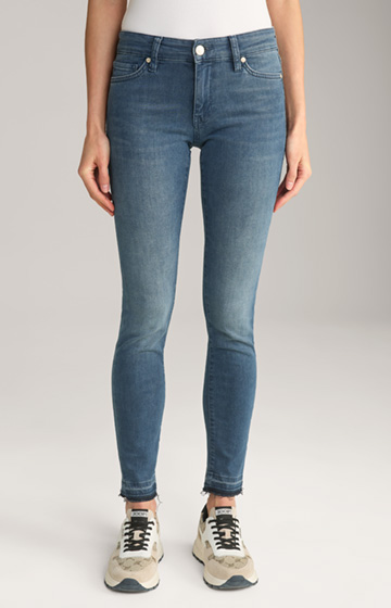 Dopasowane do sylwetki jeansy Sue w kolorze niebieskim z efektem sprania