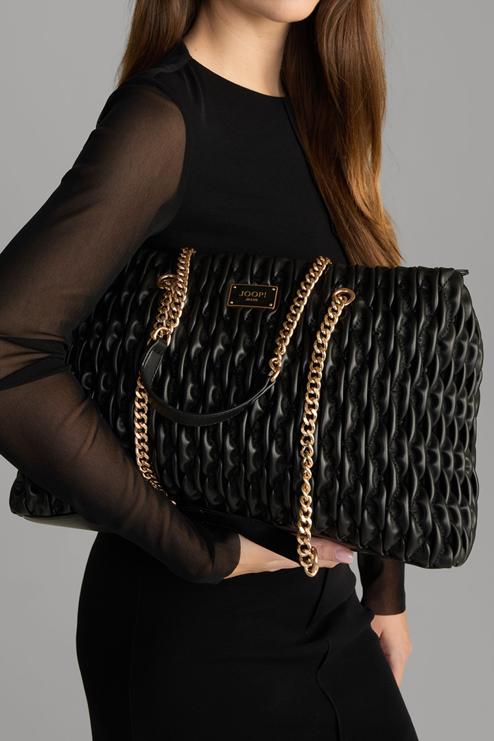 Leads to product detail page "Ruga Niecy Handbag in Black"