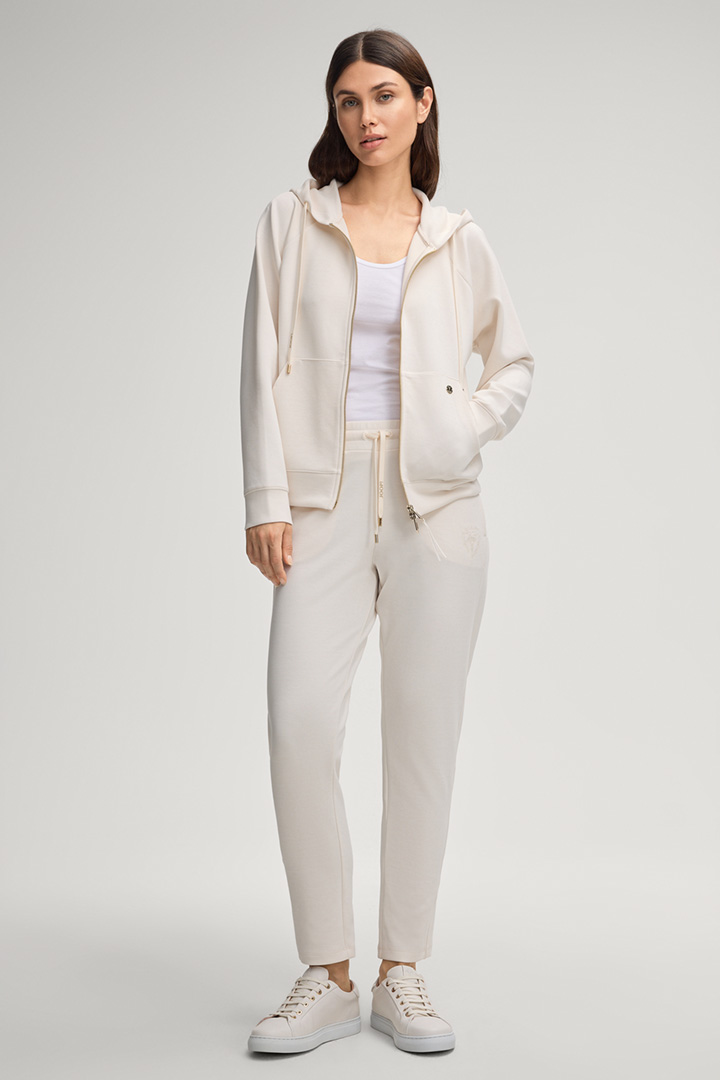 Leads to look detail page “Shop the look: Creme sweatsuit”