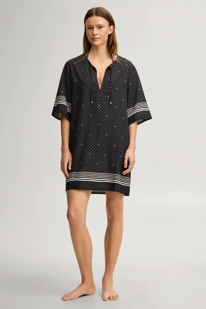 Leads to product detail page "Beach dress Brismar Beach in black and white polka dots"