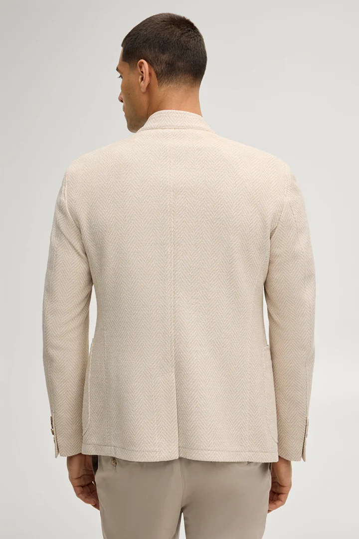 Leads to product detail page "Hiro jacket in beige patterned fabric"