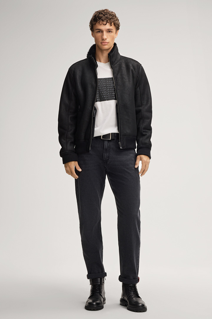 Leads to product detail page "Razor Shearling Leather Jacket in Black"