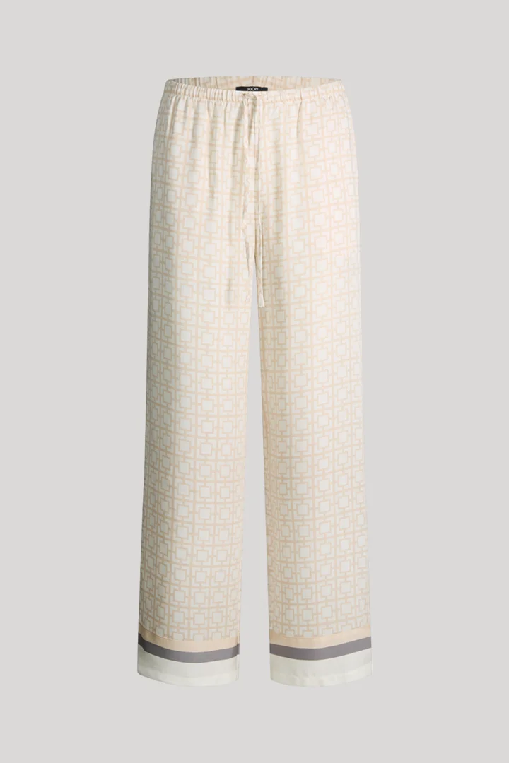 Leads to product detail page "Modern Essence lounge trousers in cream with pattern"