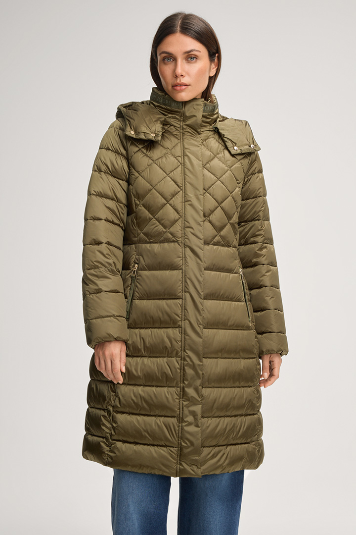 Leads to product detail page "Constance Quilted Coat in Olive Green"