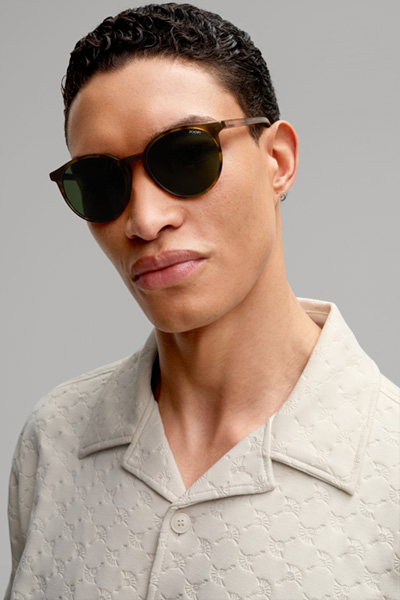 Führt zu Produktdetailseite „Sonnenbrille in Braun/Grün"
