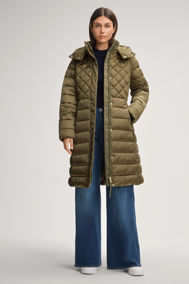 Leads to product detail page "Constance Quilted Coat in Olive Green"