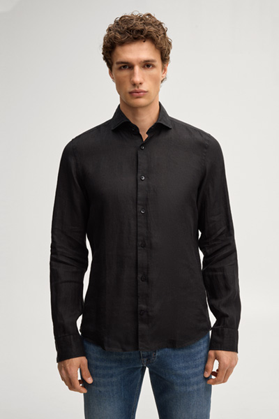 Leads to product detail page "Pai Linen Shirt in black"