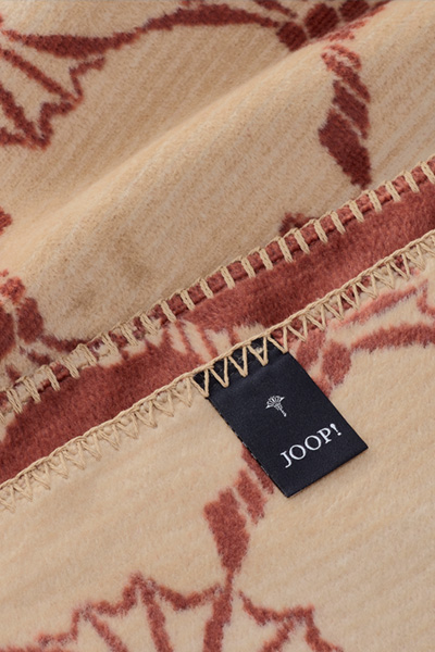 Führt zu Produktdetailseite „JOOP! CORNFLOWER Wohndecke 150x200 cm, braun"