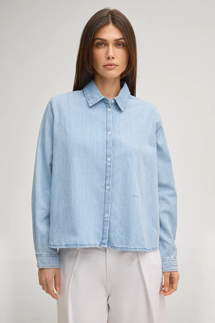 Leads to product detail page "Urmina denim blouse in light washed denim blue"