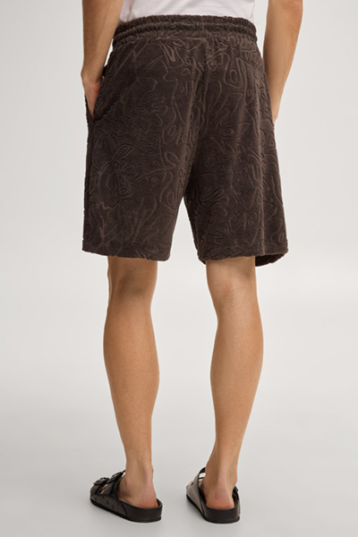 Leads to product detail page "Wailoa patterned sweat shorts in dark brown"