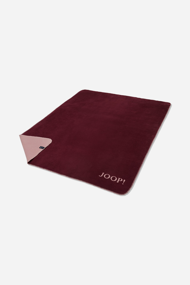 Führt zu Produktdetailseite „Wohndecke JOOP! UNI-DOUBLEFACE in Rouge/Nude, 150 x 200 cm"