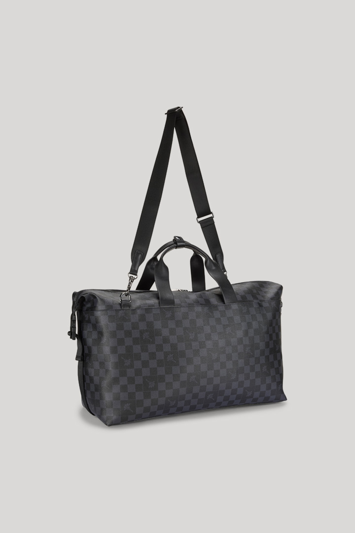 Leads to product detail page "Cortina Piazza Maik Weekender in Black"