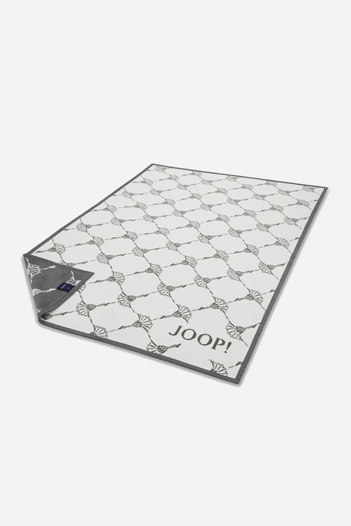 Führt zu Produktdetailseite „Wohndecke JOOP! OUTDOOR CORNFLOWER in Natur/Stein, 125 x 170 cm"