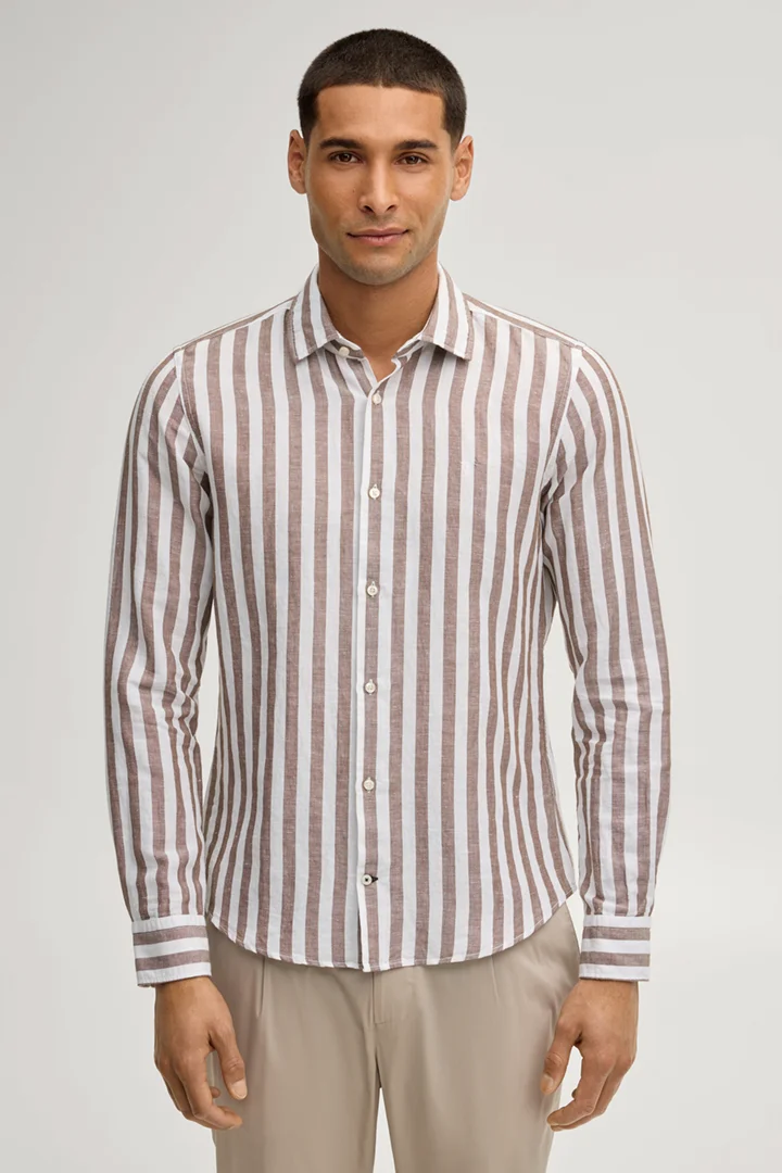 Leads to product detail page "Pit shirt in brown stripes"