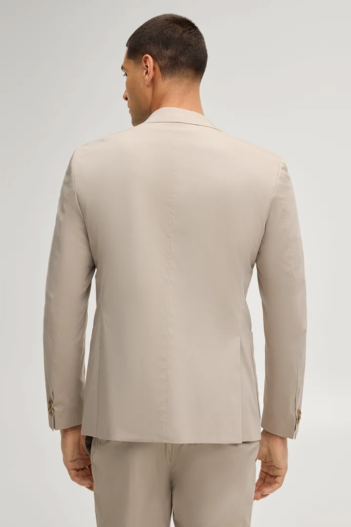 Leads to product detail page "Dallas modular jacket in light beige"