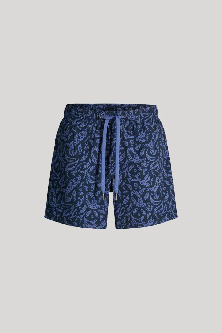 Leads to product detail page "Swim shorts in navy/blue patterned"