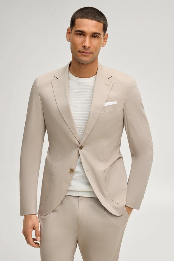 Leads to product detail page "Dallas modular jacket in light beige"