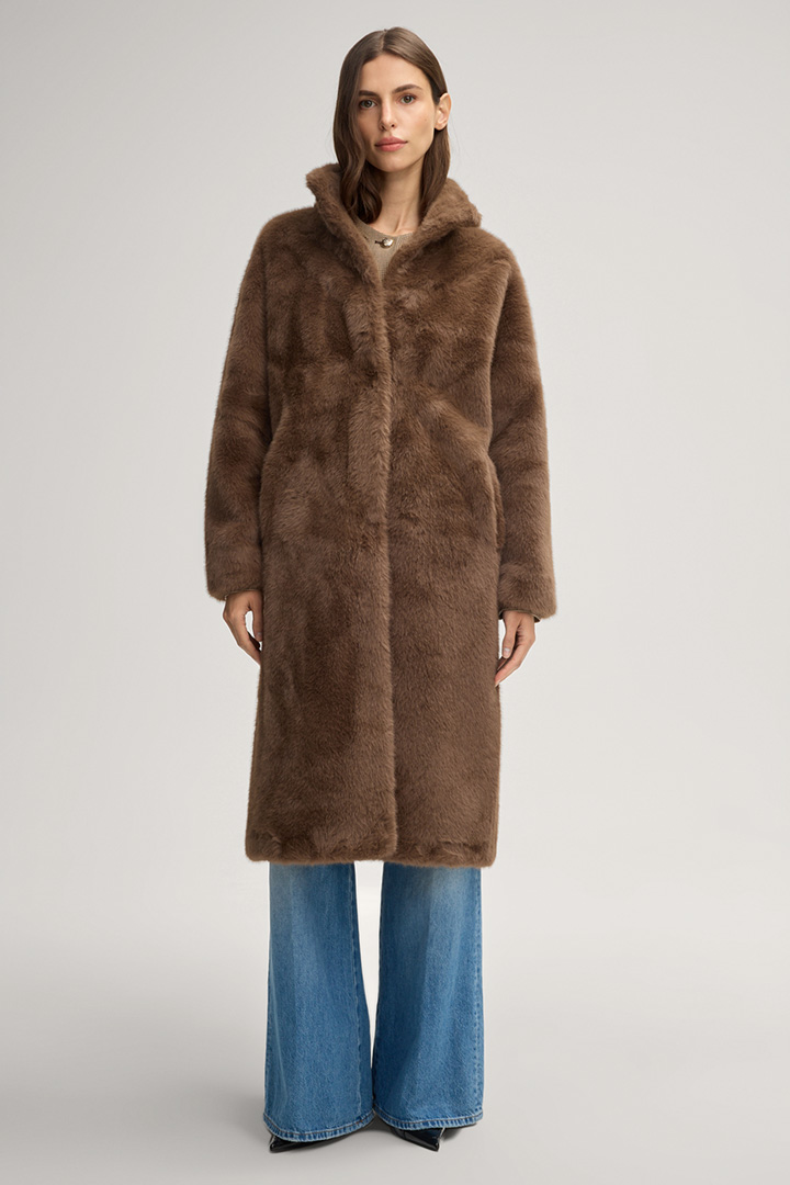 Leads to product detail page "Cim Teddy Coat in Cognac"