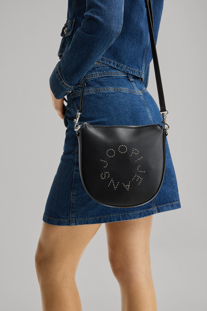 Leads to product detail page "Giro Borchia Stella Shoulder Bag in Black"