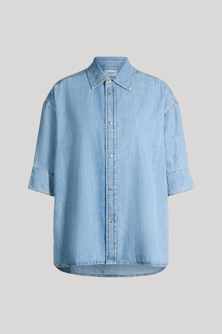 Leads to product detail page "Uma shirt blouse in light blue denim"