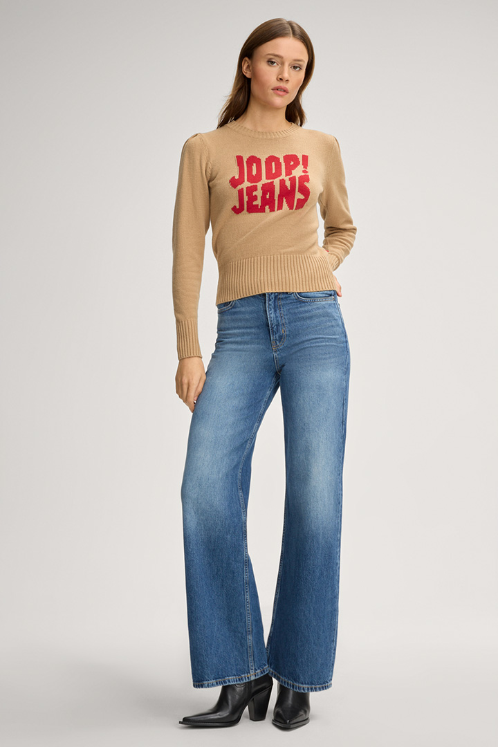 Leads to product detail page "Kali Pullover in Beige"