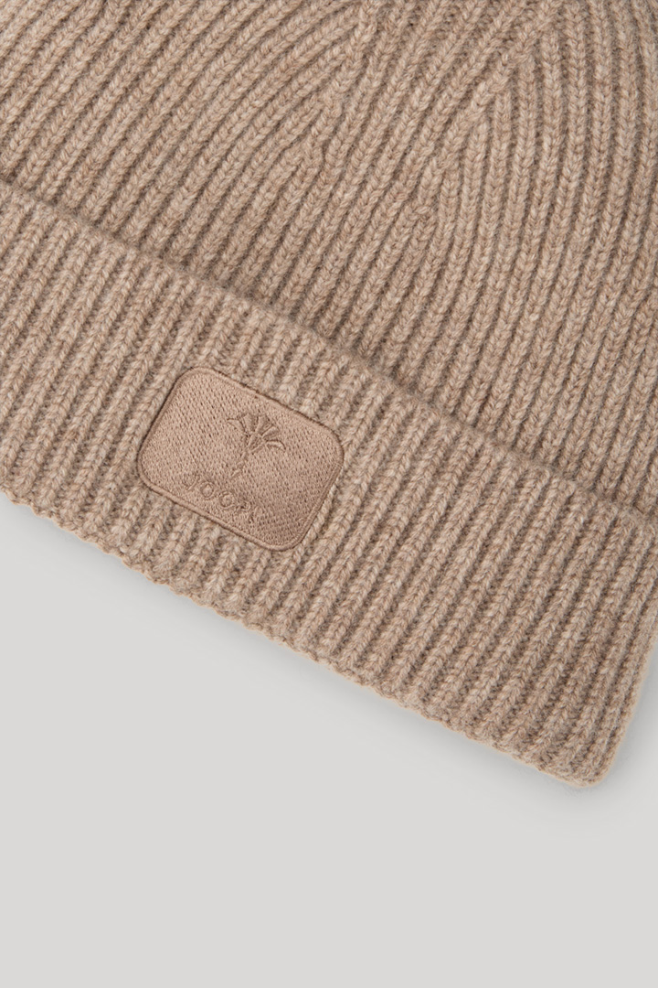 Leads to product detail page "Knitted Beanie in Taupe"