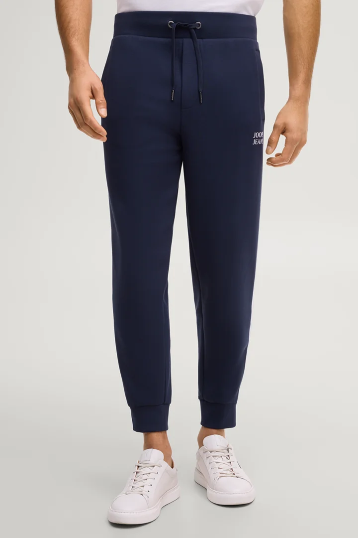 Leads to product detail page "Aka sweatpants in navy"