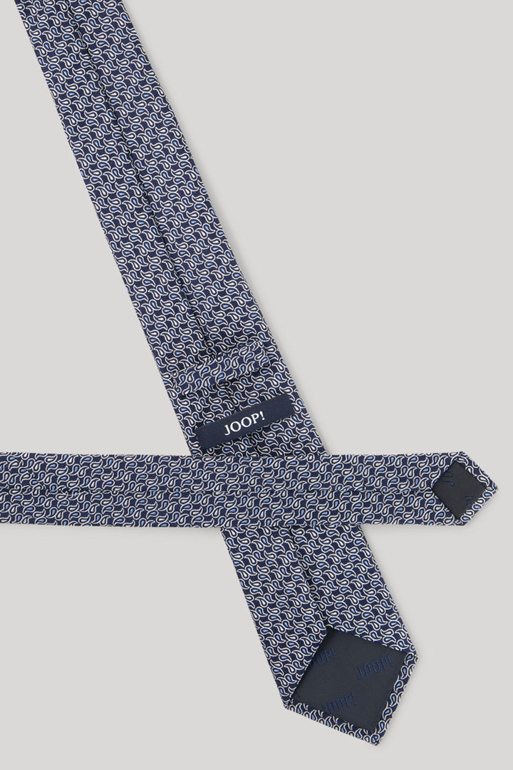 Führt zu Produktdetailseite „Krawatte in Navy gemustert"