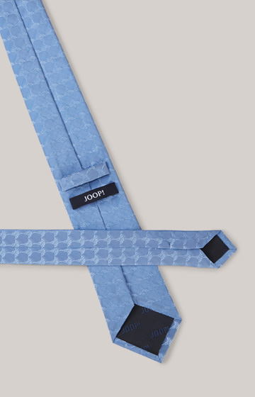 Krawat jedwabny w kolorze jasnoniebieskim we wzór