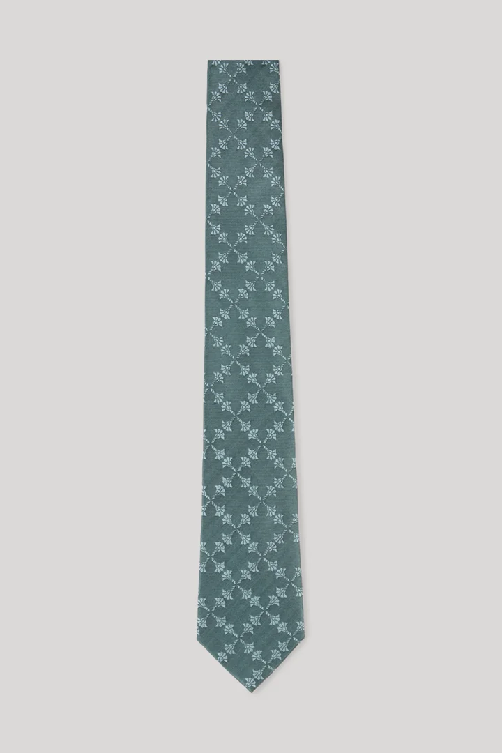 Leads to product detail page "Tie in sage pattern"