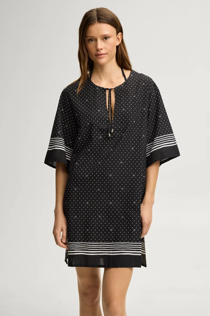 Leads to product detail page "Beach dress Brismar Beach in black and white polka dots"