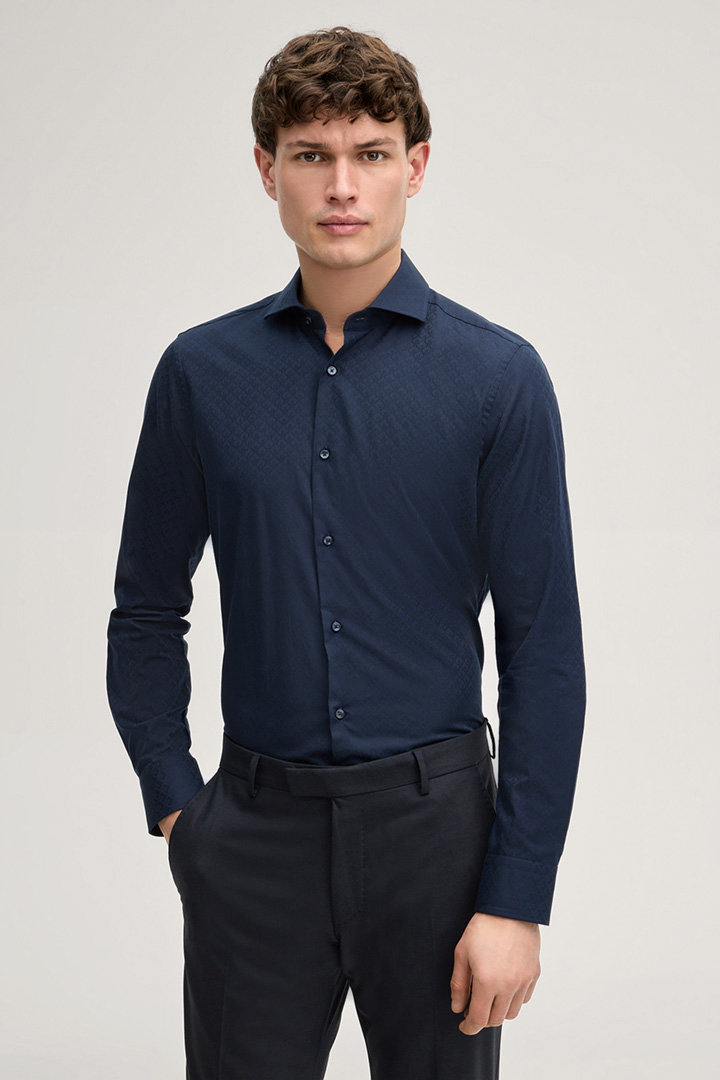 Leads to product detail page "Pares Shirt in Navy"