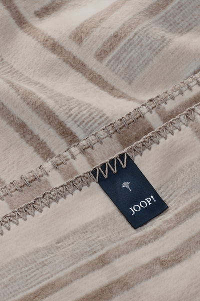 Führt zu Produktdetailseite „JOOP! WEAVE Wohndecke 150x200 cm, sand"