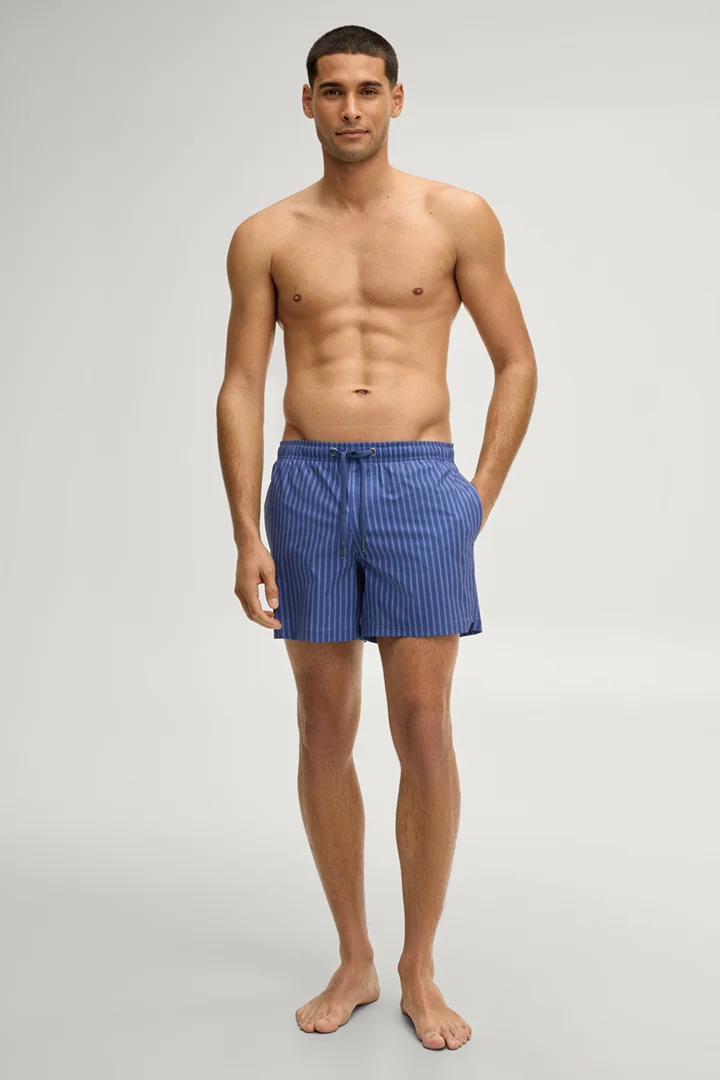 Leads to product detail page "Blue striped swim shorts"