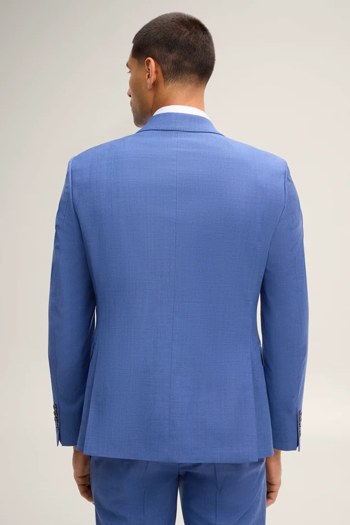 Leads to product detail page "Herby modular jacket in medium blue with a pattern"