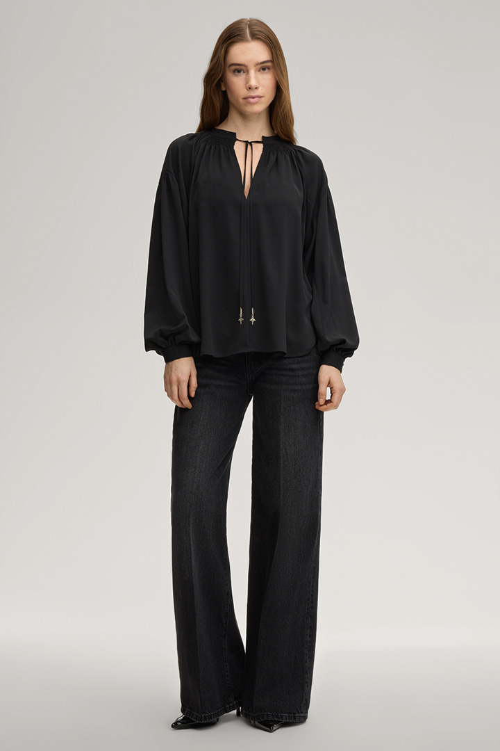 Führt zu Produktdetailseite „Bluse Brigida in Schwarz"