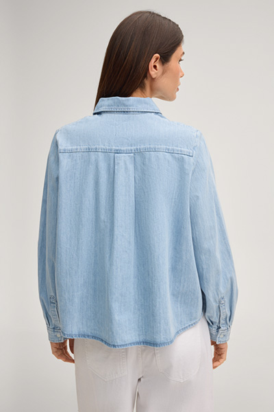 Urmina denim blouse in light washed denim blue