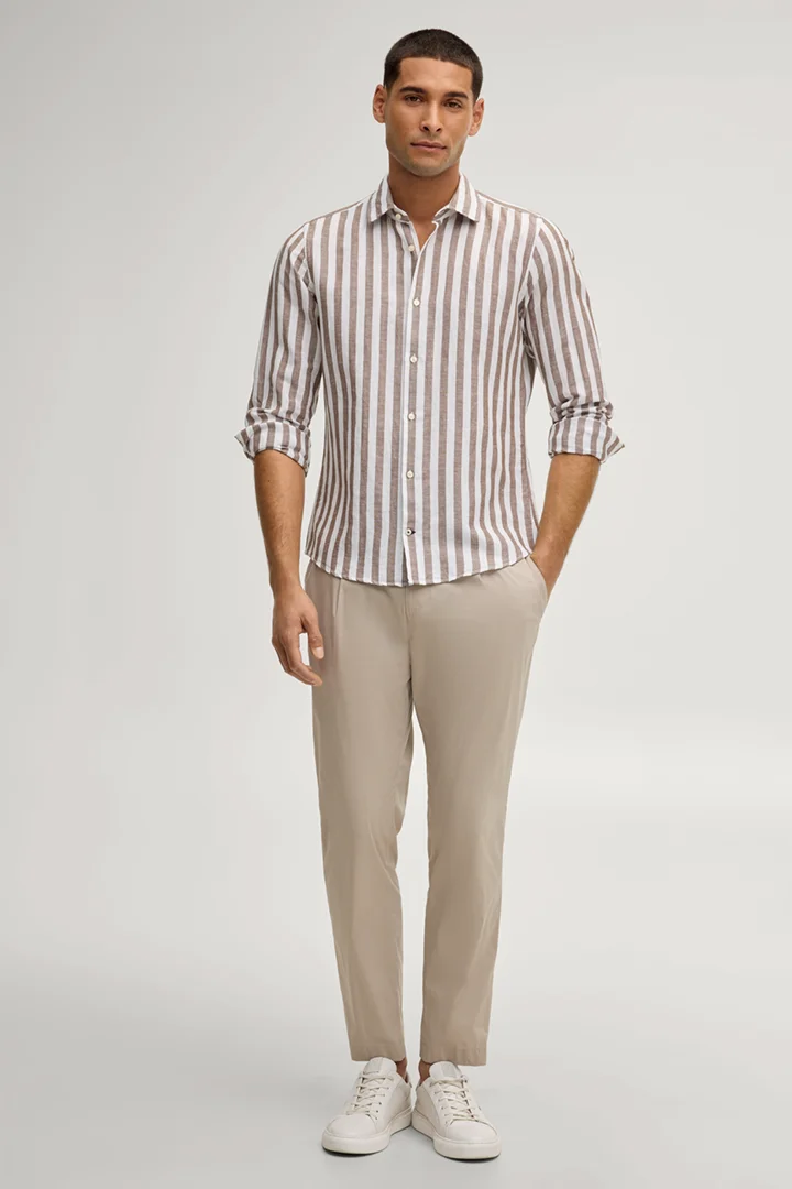 Leads to product detail page "Pit shirt in brown stripes"