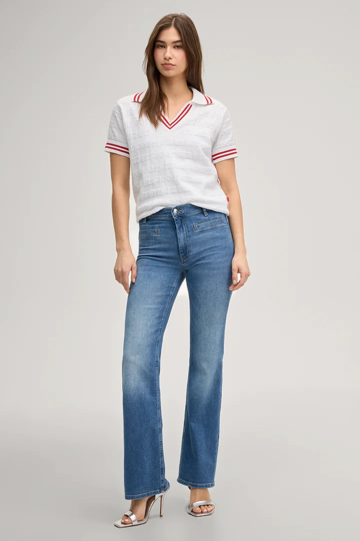 Leads to product detail page "Boocut jeans Elfi in mid blue denim, high waist"