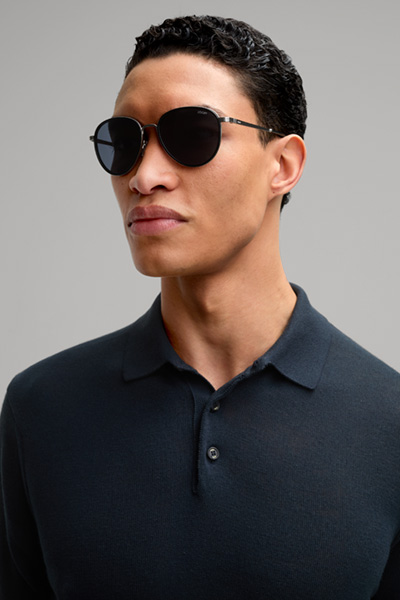 Führt zu Produktdetailseite „Sonnenbrille in Blau/Schwarz"