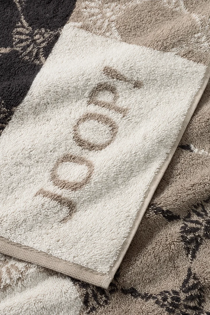 Leads to product detail page "Joop! sauna towel in cream/beige/brown pattern"