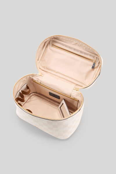 Leads to product detail page "Cortina Piazza Flora Beauty Case in Ecru"