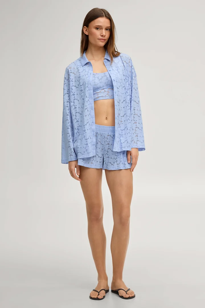 Leads to product detail page "All-over lace loungewear shirt in blue"