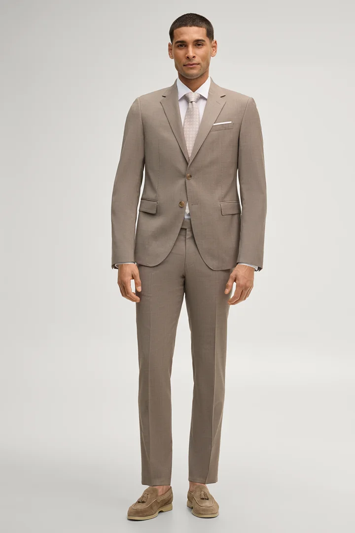 Leads to product detail page "Herby modular jacket in beige"