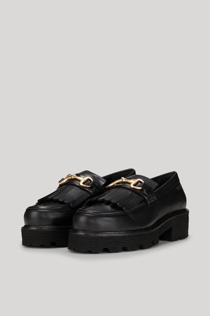 Leads to product detail page "Unico Mariana Loafers in Black"