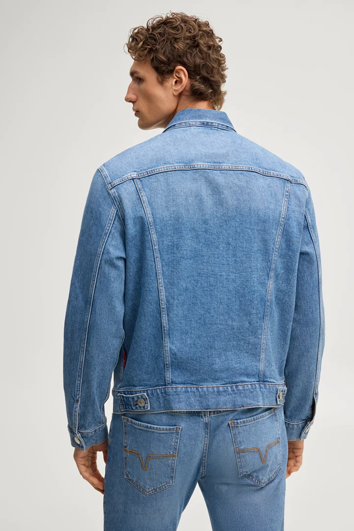 Leads to product detail page "Jaxon denim jacket in mid-blue"