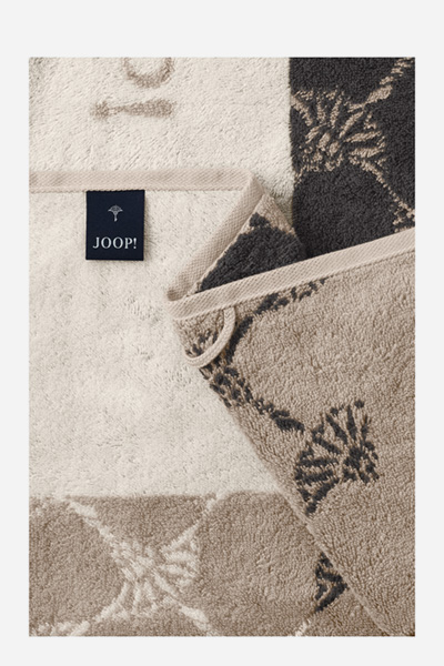 Leads to product detail page "Joop! sauna shower towel in cream/beige/brown pattern"