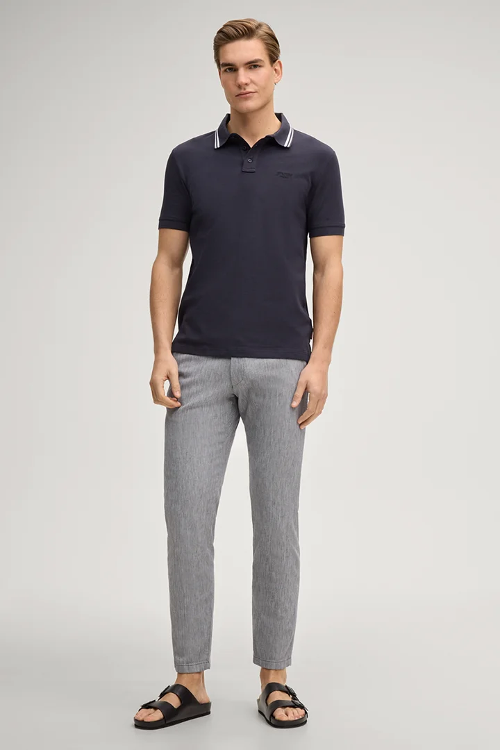 Leads to product detail page "Agneloa polo shirt in dark blue"