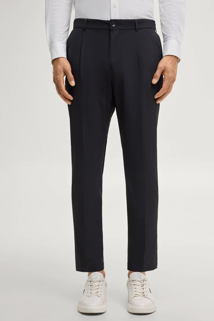 Leads to product detail page "Dynamic Lester pleated trousers in navy"