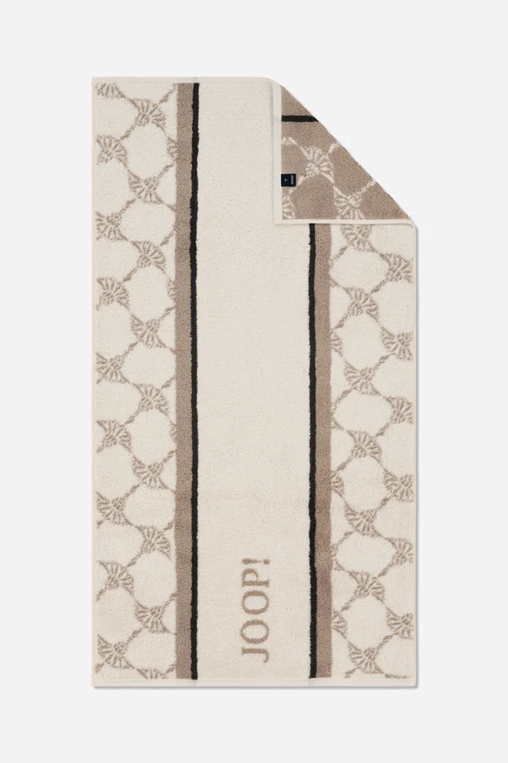 Leads to product detail page "Joop! sauna shower towel in cream and light brown with a pattern"